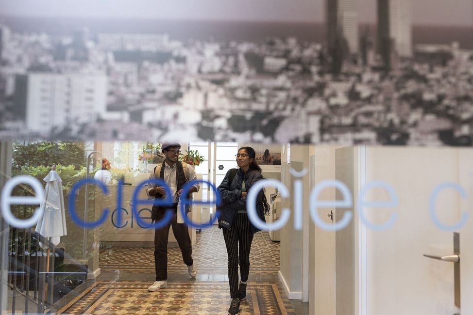 Students walking out CIEE office doors abroad