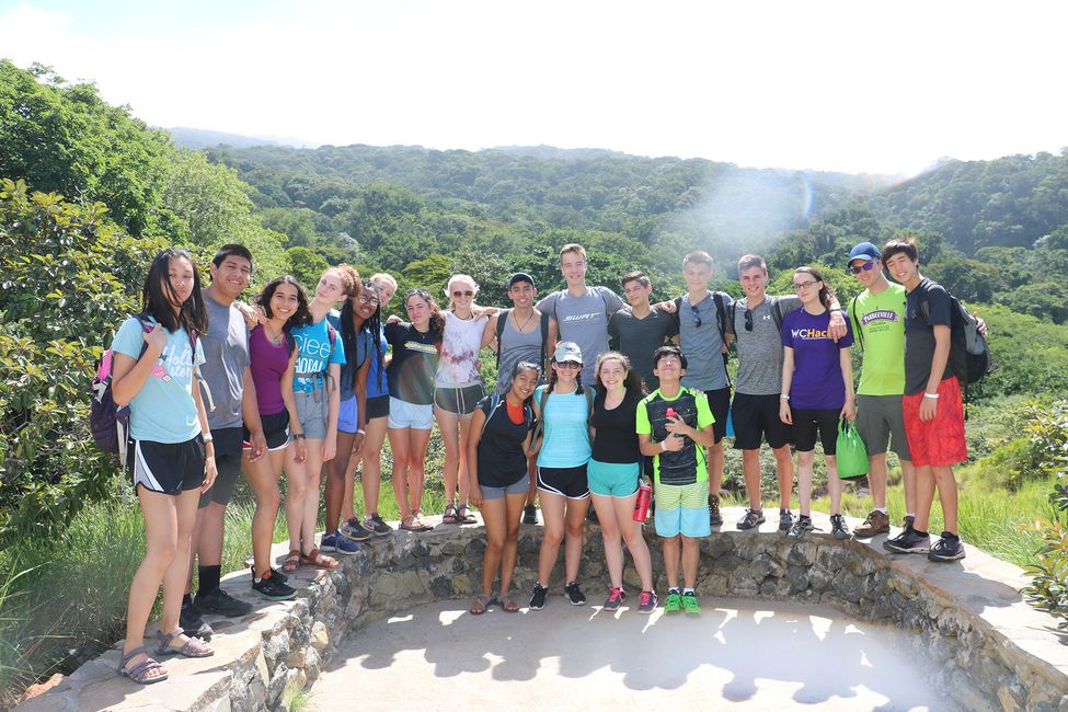 monteverde_group-shot-of-students-in-front-of-landscape.jpg