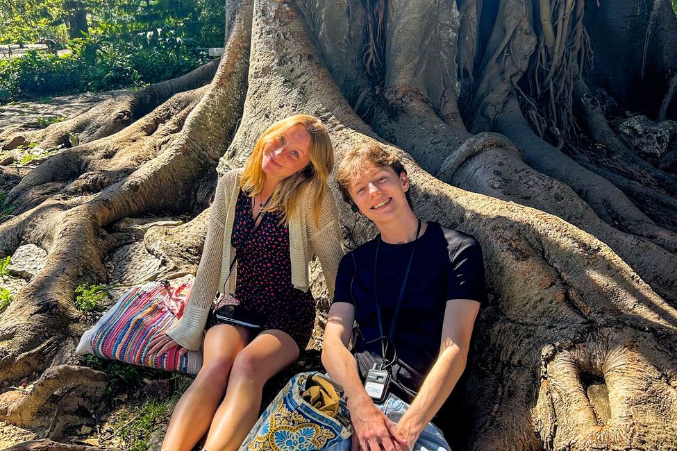 lisbon_students-leaning-on-tree.jpg