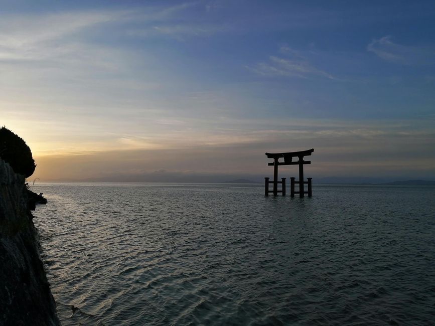 sun-rises-on-a-shinto-shrine-torii-gate-in-lake-biwa-near-kyoto-japan.jpg