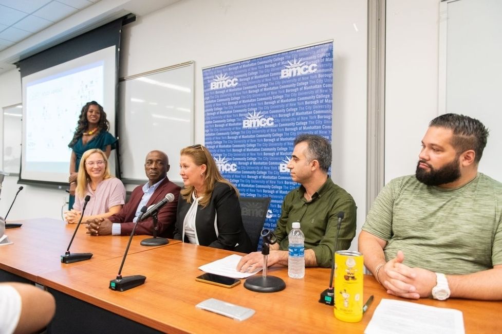 BMCC faculty sitting side-by-side on a panel