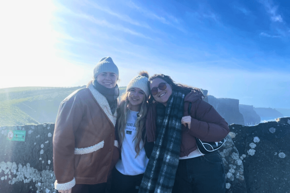 ireland-women-hiking-cold-cliffs