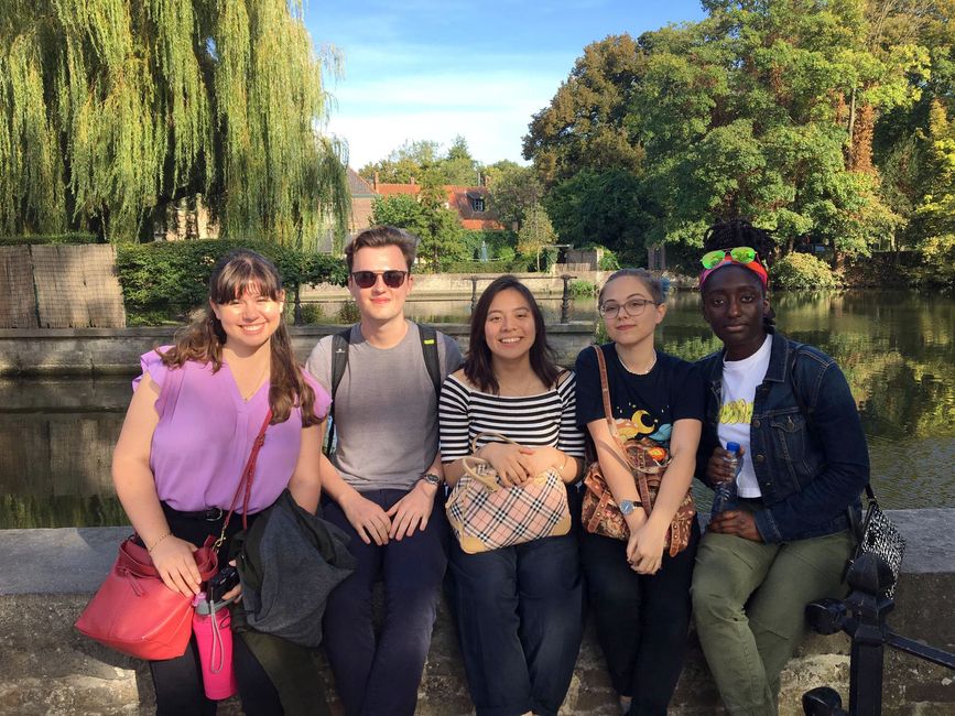 Students by a pond in Brussels