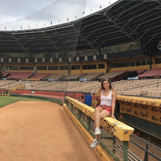 Octavia Tey visits a baseball stadium in Santiago de los Caballeros, Dominican Republic, while participating in CIEE's Global Navigator study abroad program.