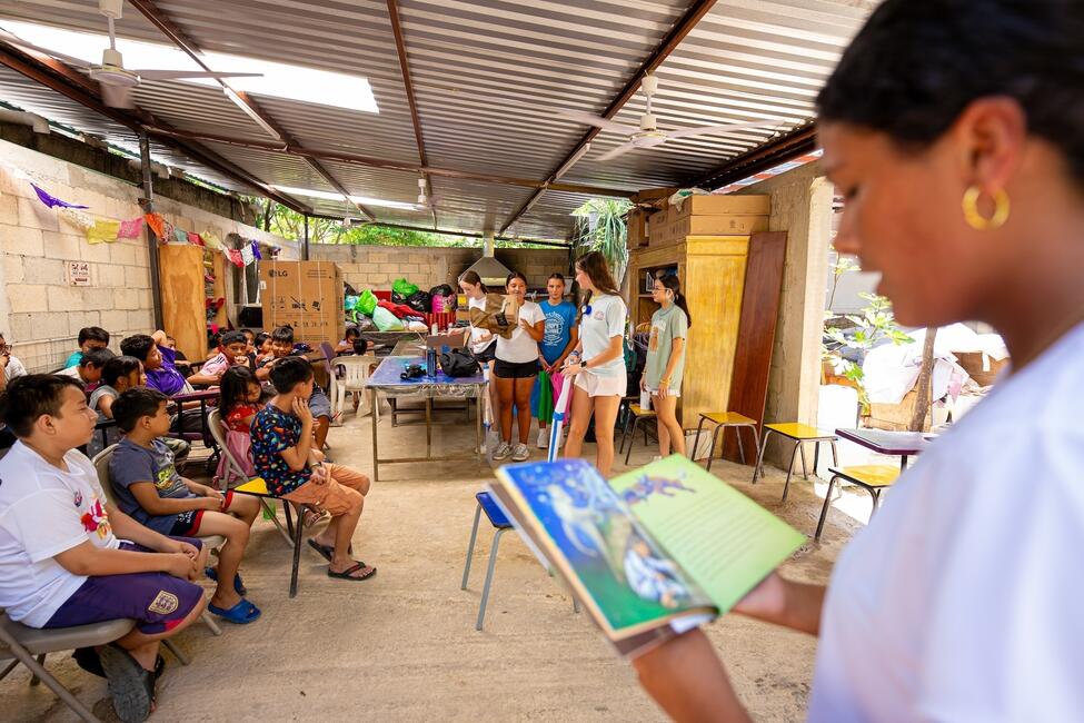 CIEE Good Neighbor PlayLab students lead a storytime activity for local children in Mérida, Mexico.