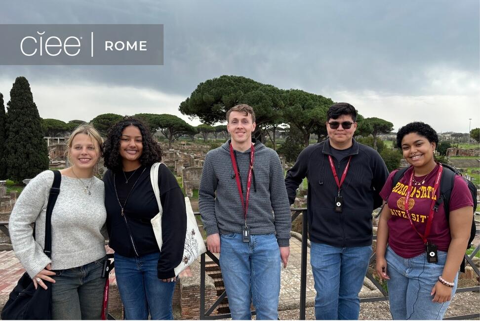 A group of 5 students with red "ASU" lanyards stand in front of historic ruins, with a "CIEE Rome" logo at the top of the photo