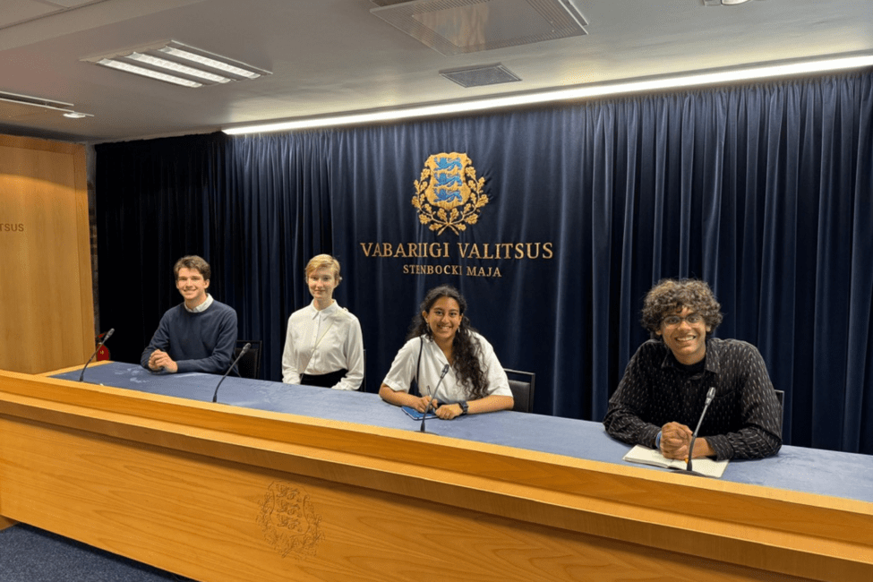 hssa-tallin-students-at-a-desk.png
