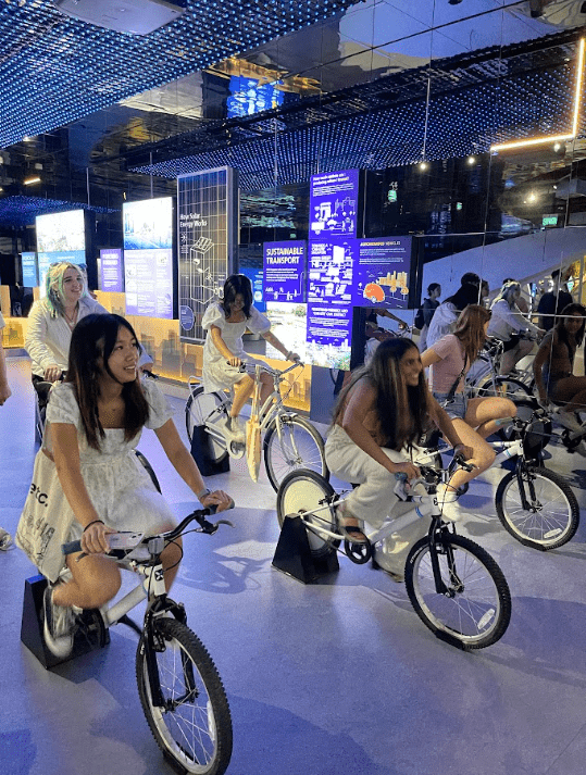 Students tried their hand at biking after learning about the increased efforts by Singapore to promote biking within the city.