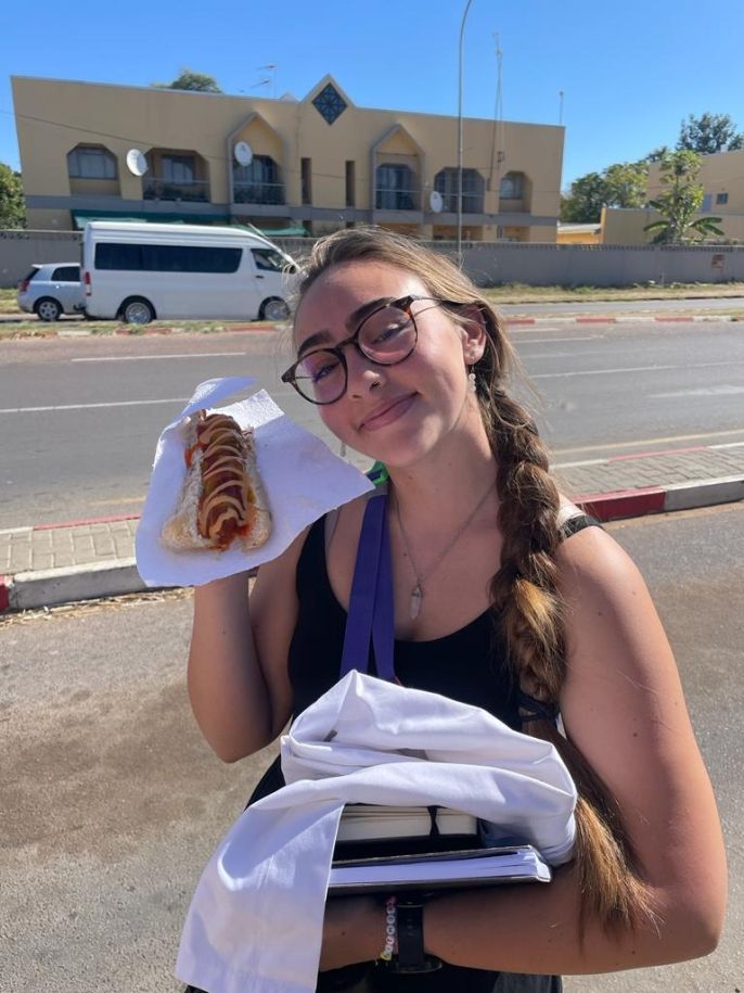 Holding a huge hotdog at the UB front gate