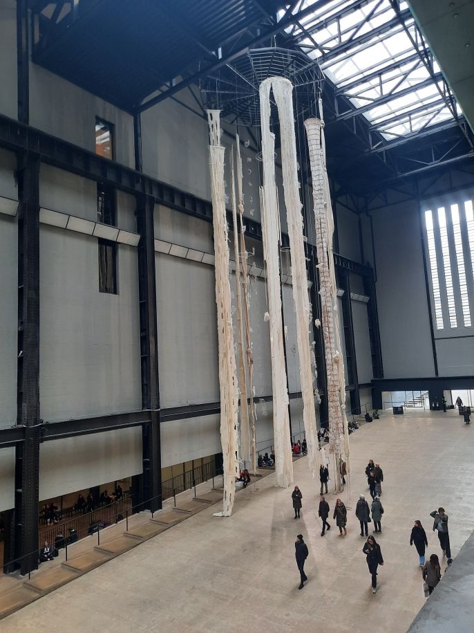 A large art installation going from floor to ceiling in the Turbine Hall at the Tate Modern