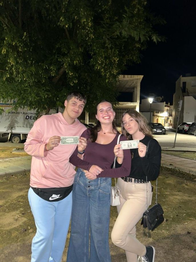 Me with my friends from school. I gave them both an American dollar (which they thought was amazing) and we had to take pictures!
