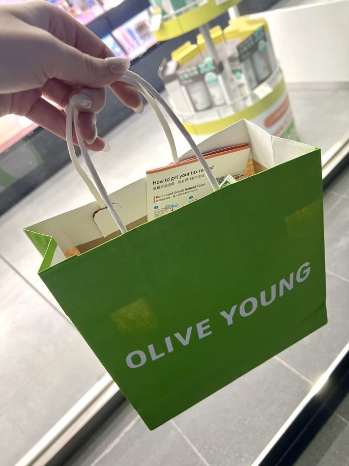 Nothing better than holding an Olive Young bag after questionable financial decision making.