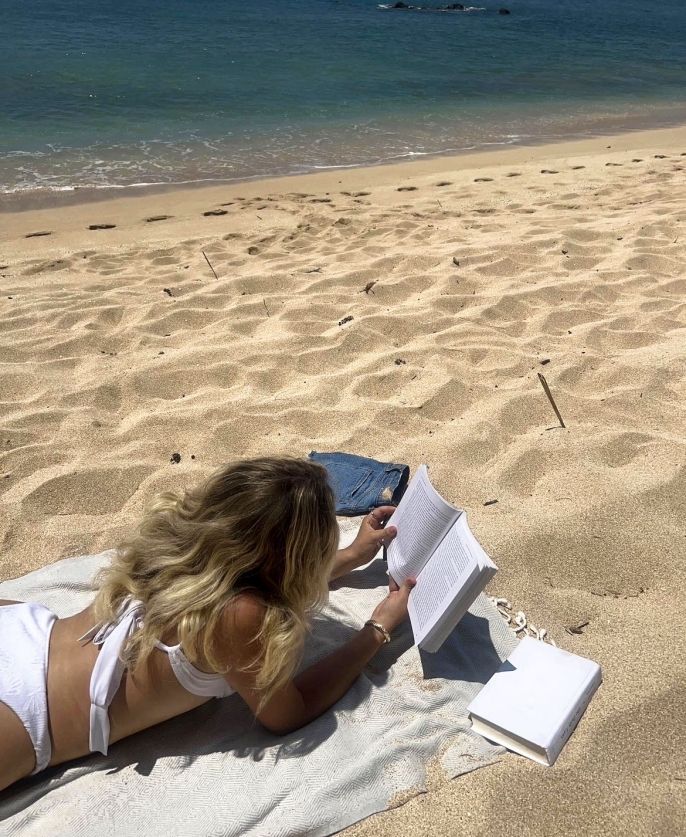 Tayler Baldwin studying on a beach in Ericeira, Portugal