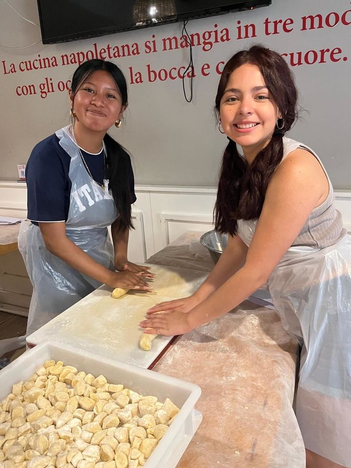 Students rolling out dough
