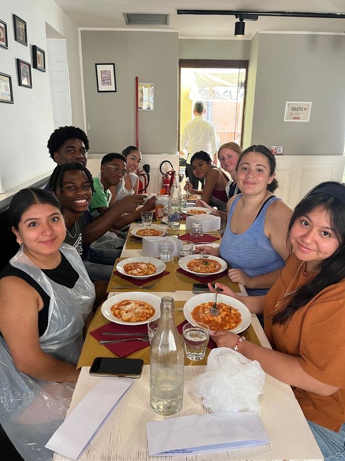 Students with the gnocchi they prepared