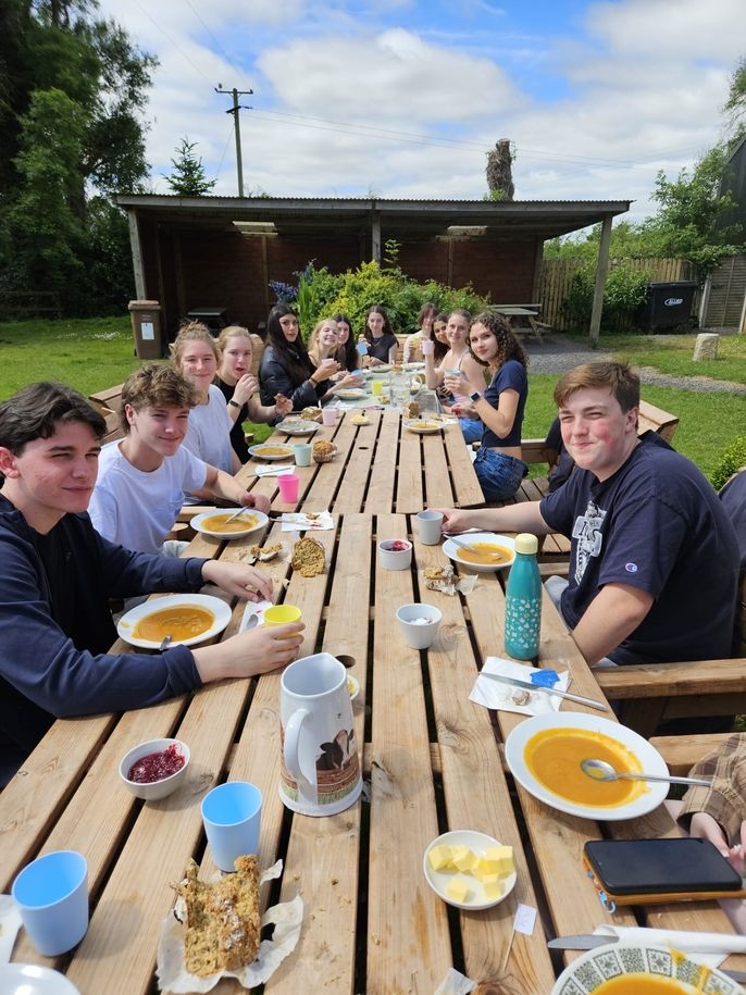 Students enjoy soup and the bread they made. 