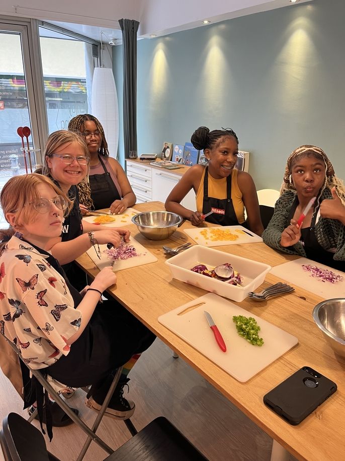 Students proudly working on their tapas plates. 