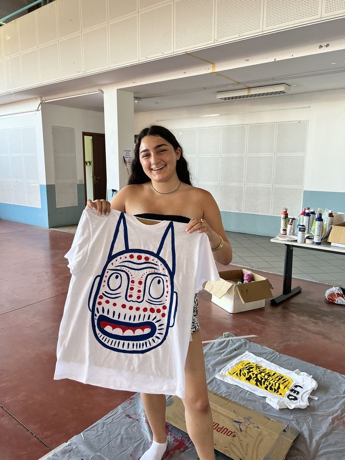 Showing her finished product 