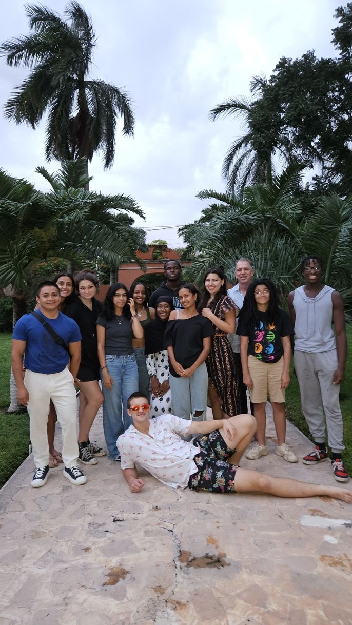 Students with their teacher Josué