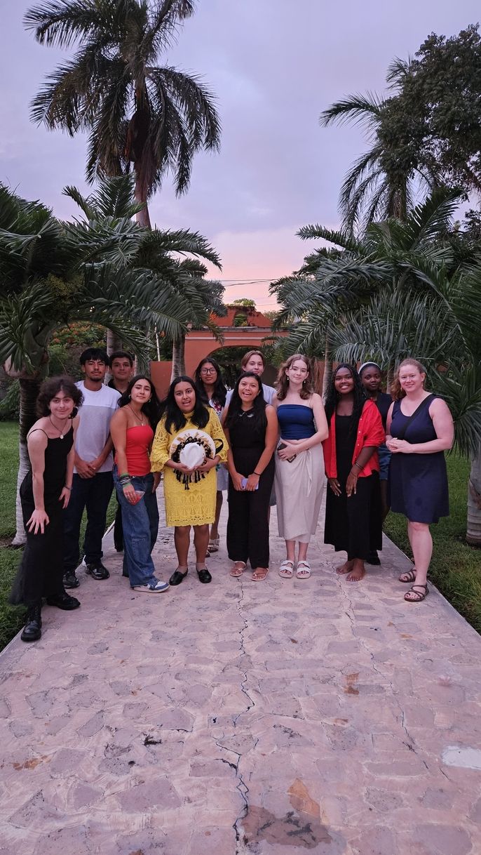 Students with their teacher Pilar.