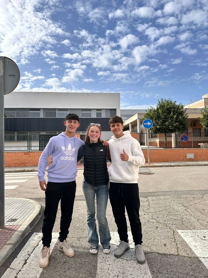 Teens posing on street while studying abroad in Spain