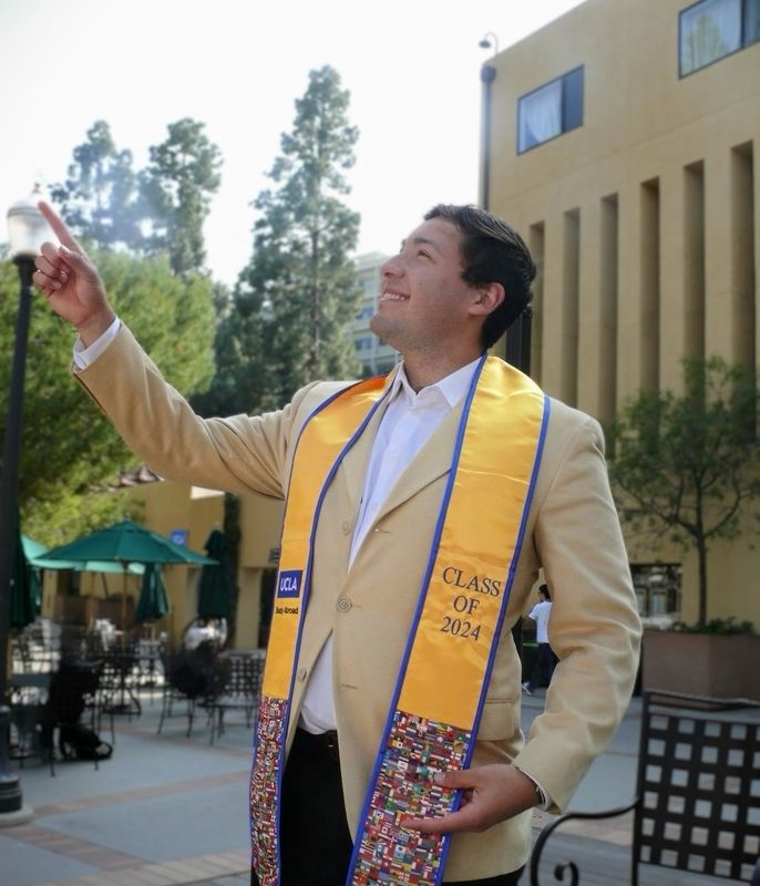 Ricardo Pointing up Grad pic 2024
