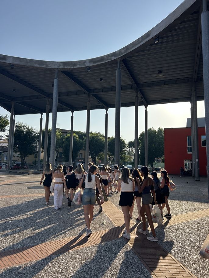 Students walking home from the grocery store in Florence, Italy