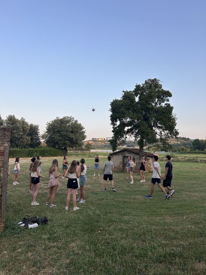 Students play volleyball in Florence Italy