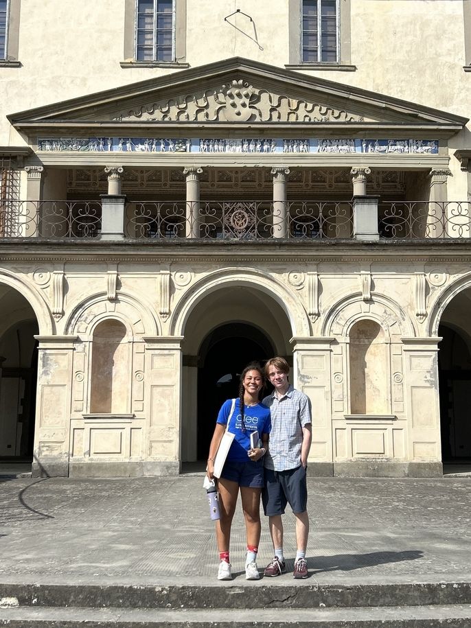 Students smile in front of Villa Medicea di Poggio a Caiano in Florence, Italy