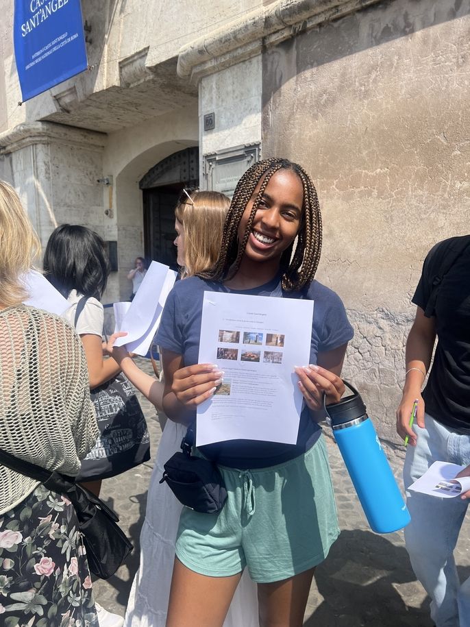 Student with assignment ready to tour the Castel!