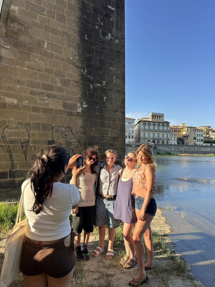 HSSA students taking photos in front of the Arno River