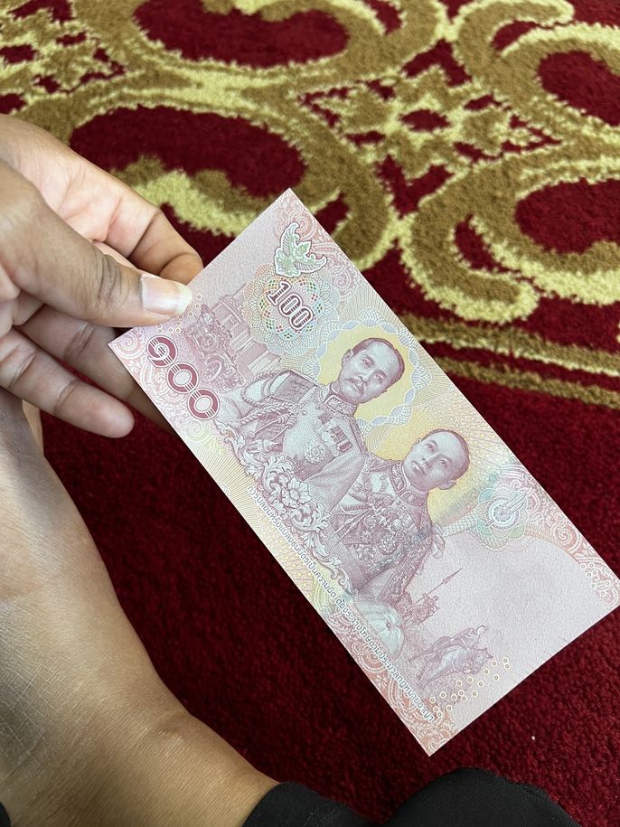 100 baht bill