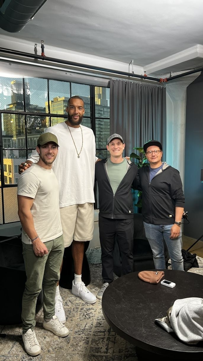 Thomas, left, had the opportunity to interview Rudy Gobert, second from left, an NBA superstar.