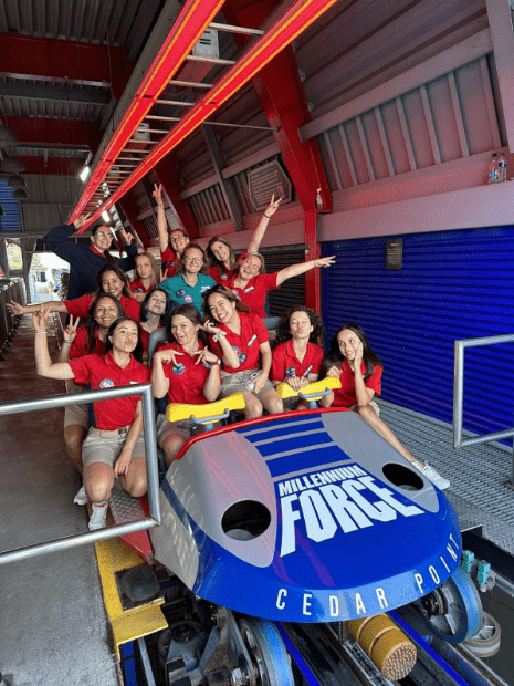 Staff from Cedar Point, A Six Flag Park in Sandusky, Ohio, pose on a ride.