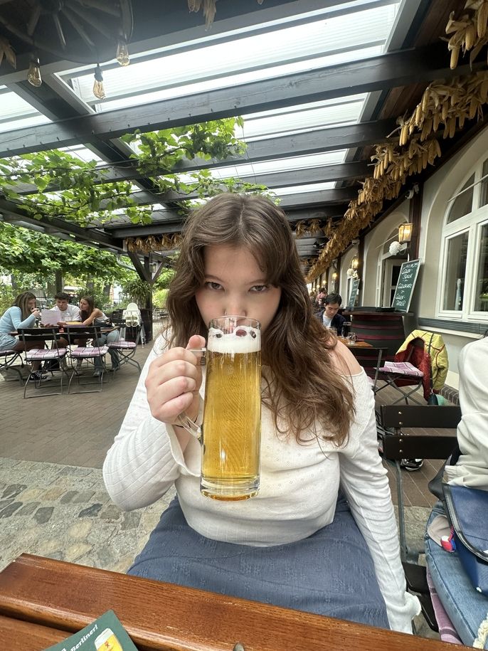 Student enjoying a Berlin specialty in Berlin.