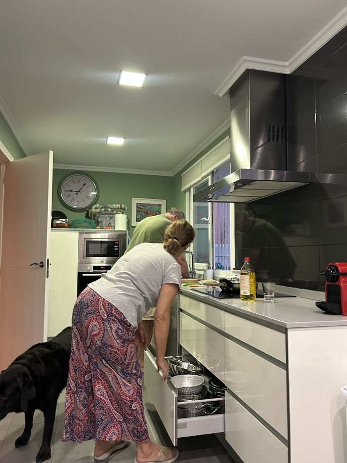 Clara and Pipo cooking and cracking up together, per usual