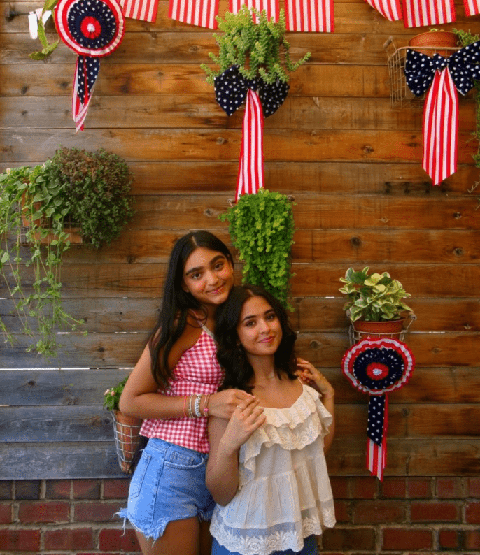 Aanshi T. (right) poses with one of her friends.