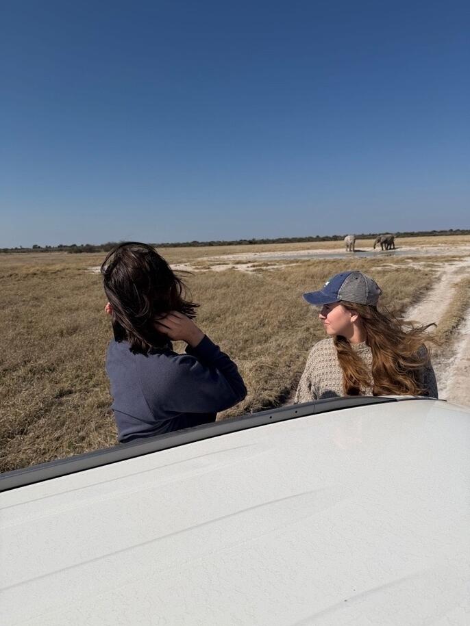 Two students enjoying the view at an excursion 