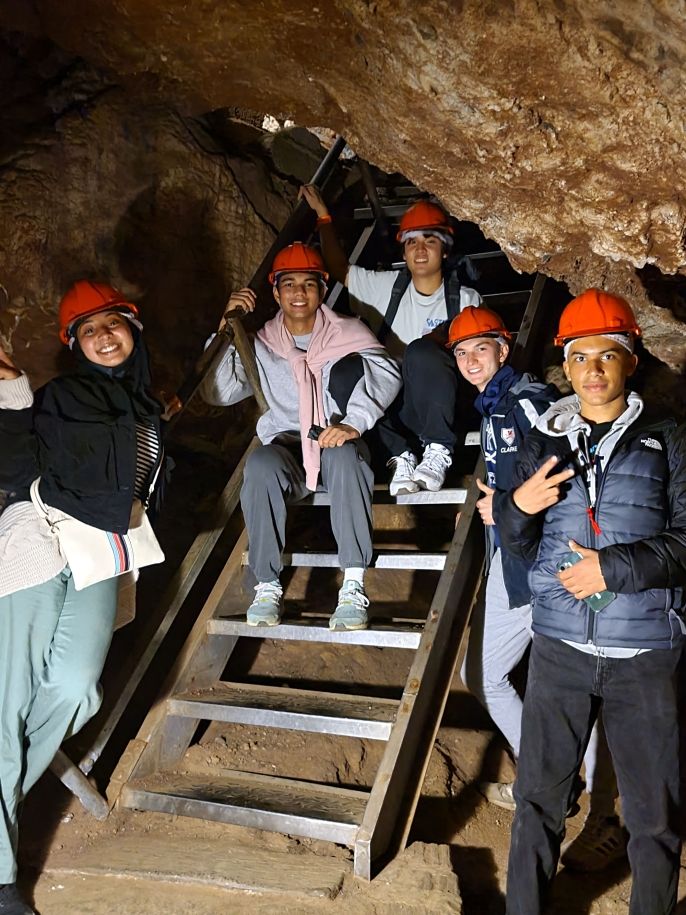 High school students spelunking