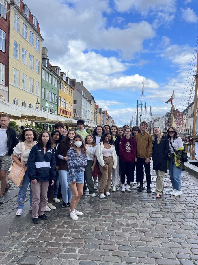 Group of high school students in Copenhagen on cobbled streets