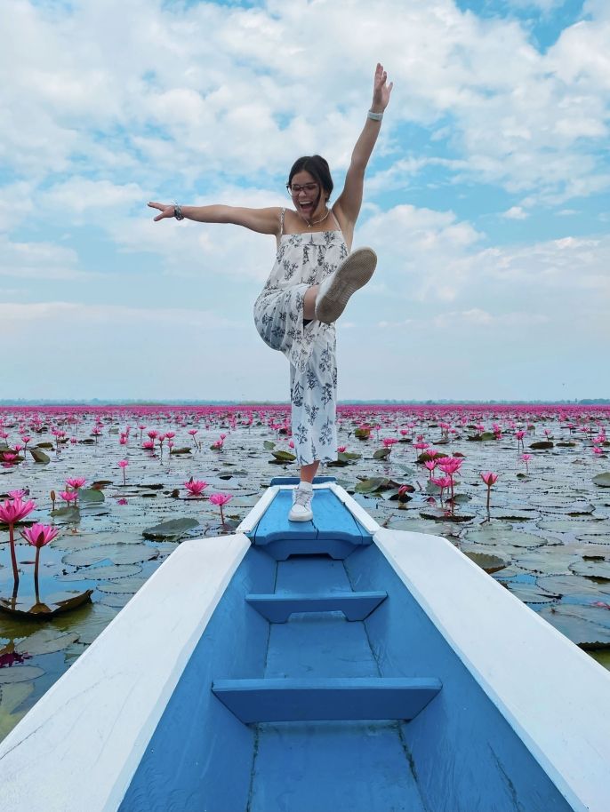 Teach Abroad participant dancing on a boat