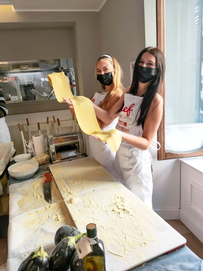 Rome girls holding pasta