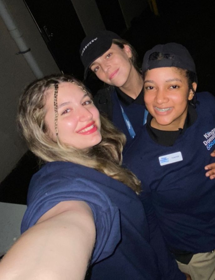 A selfie of Eleni with two friends in Kings Dominion uniforms