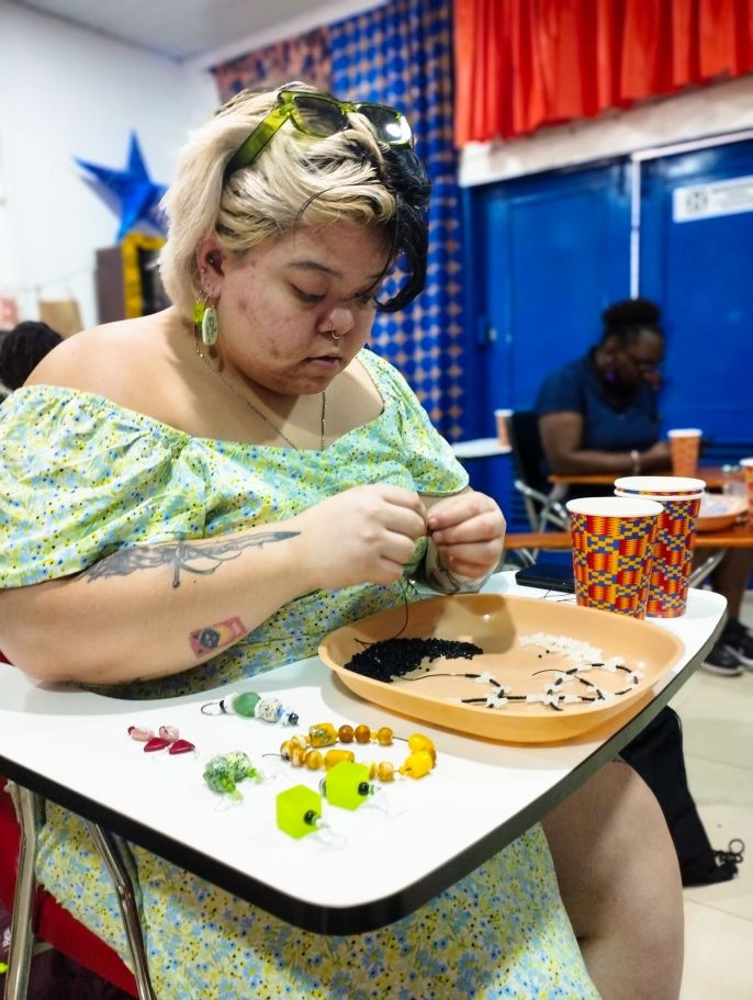 Legon student making jewelry