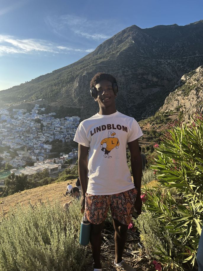 rabat_academy-t-shirt-student-smiling-landscape-morocco.jpeg