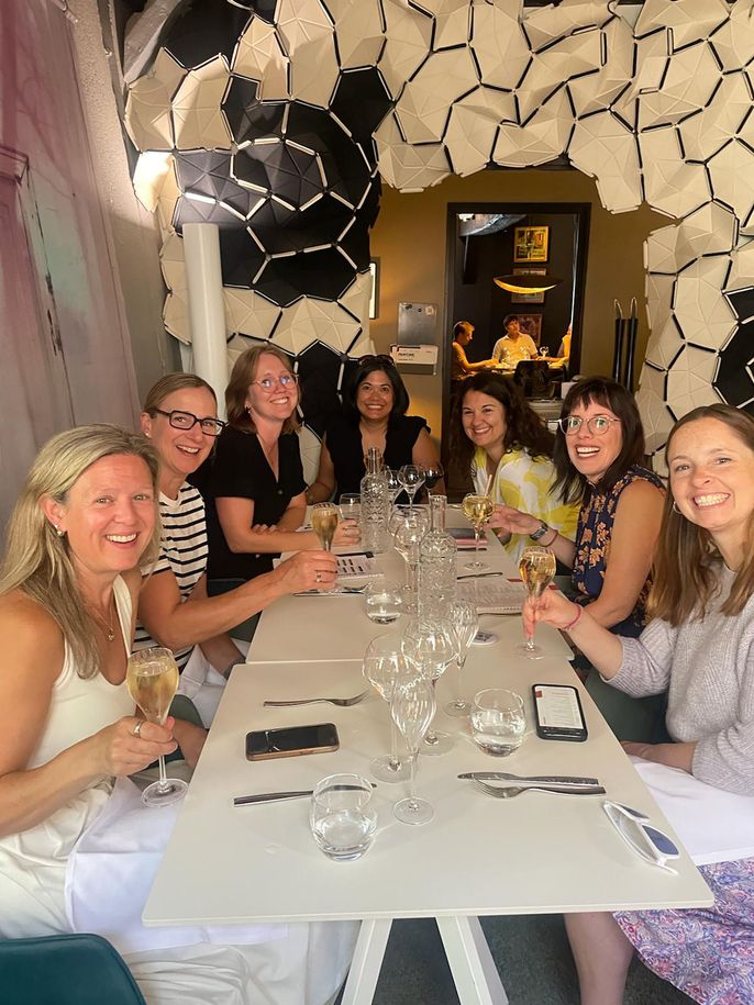 teachers enjoying themselves at restaurant in France