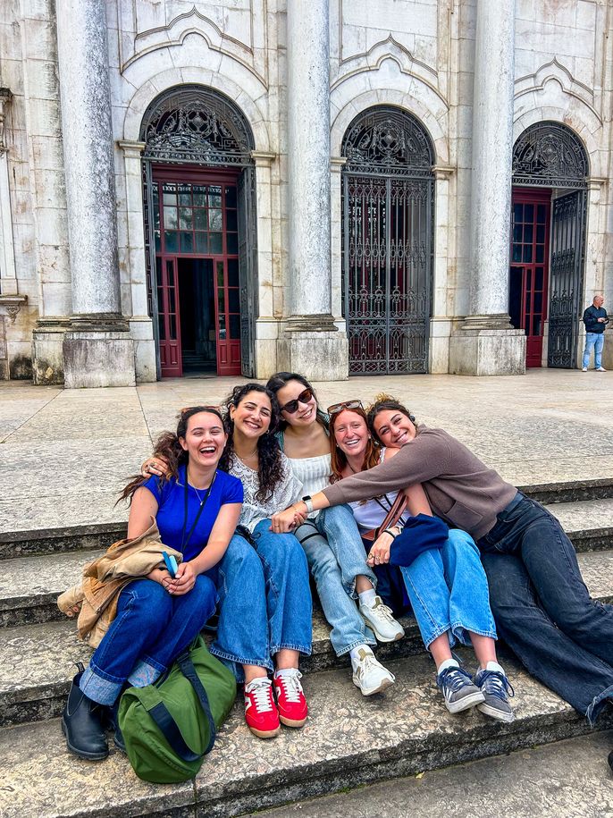 lisbon-five-women-hugging-on-steps