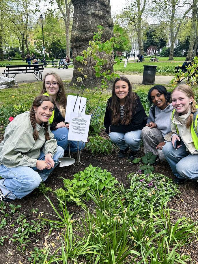 london-ccii-five-female-students-volunteering-planting-trees