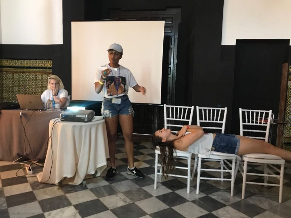 Mia and Allie performing a skit over program rules