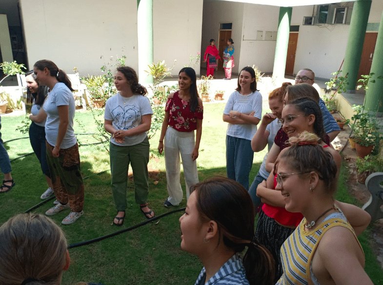 Participating in an "energizer" that we'll play with the campers